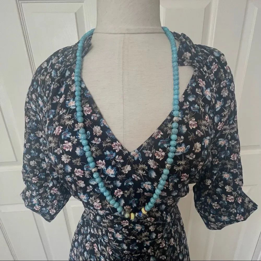 Turquoise tone long beaded necklace